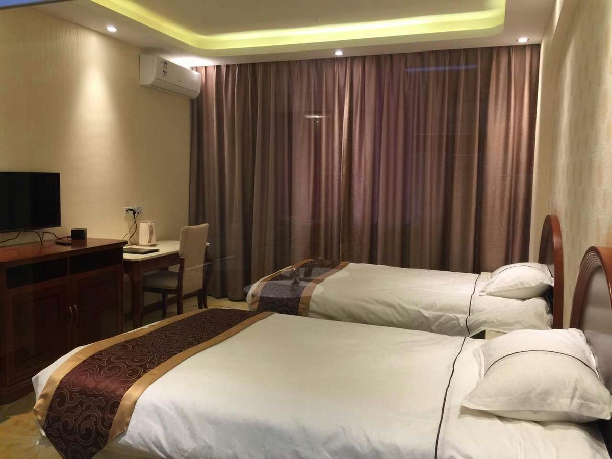 Bai Nian Sheng Shi Hotel Куньмин Экстерьер фото